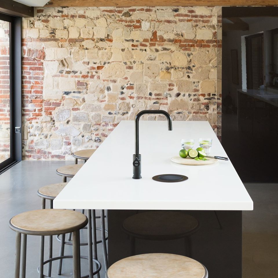 Zip HydroTap Celsius matte black finish on matching font.