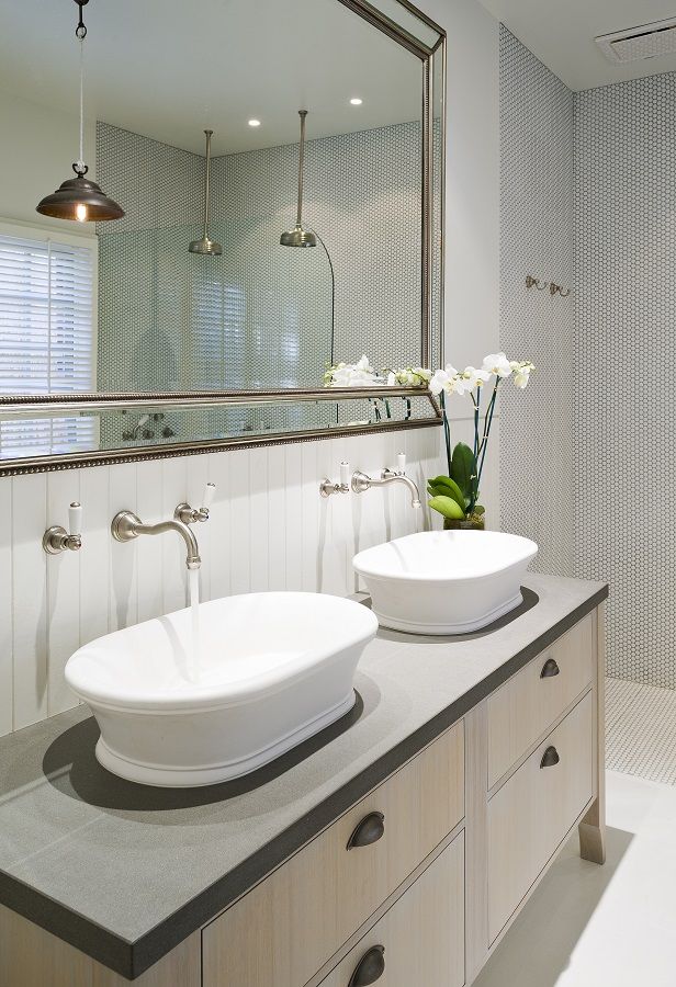 Apaiser Emerald marble basins in Glacier finish.
