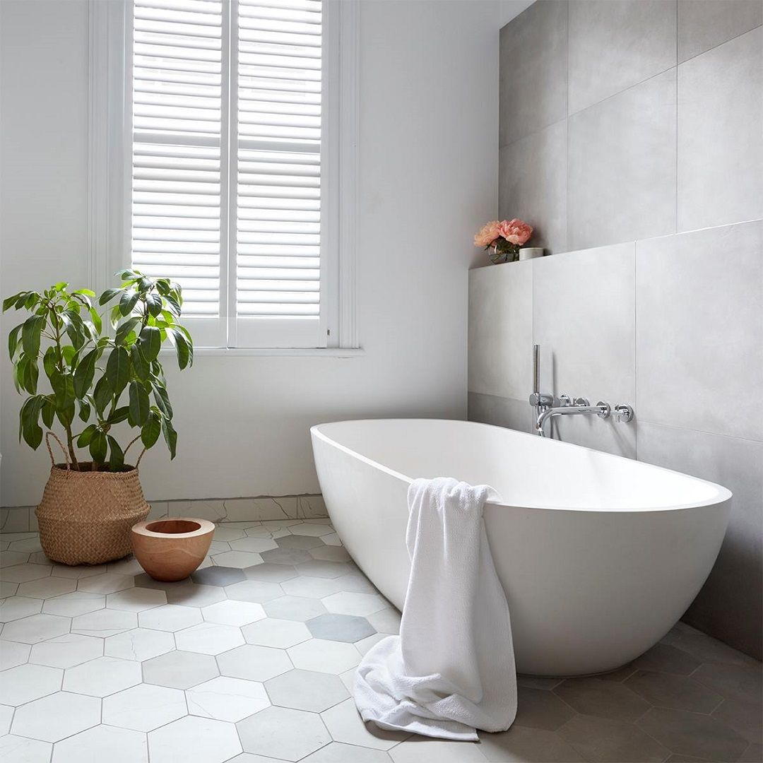 Apaiser Sublime marble freestanding bath in Glacier finish.