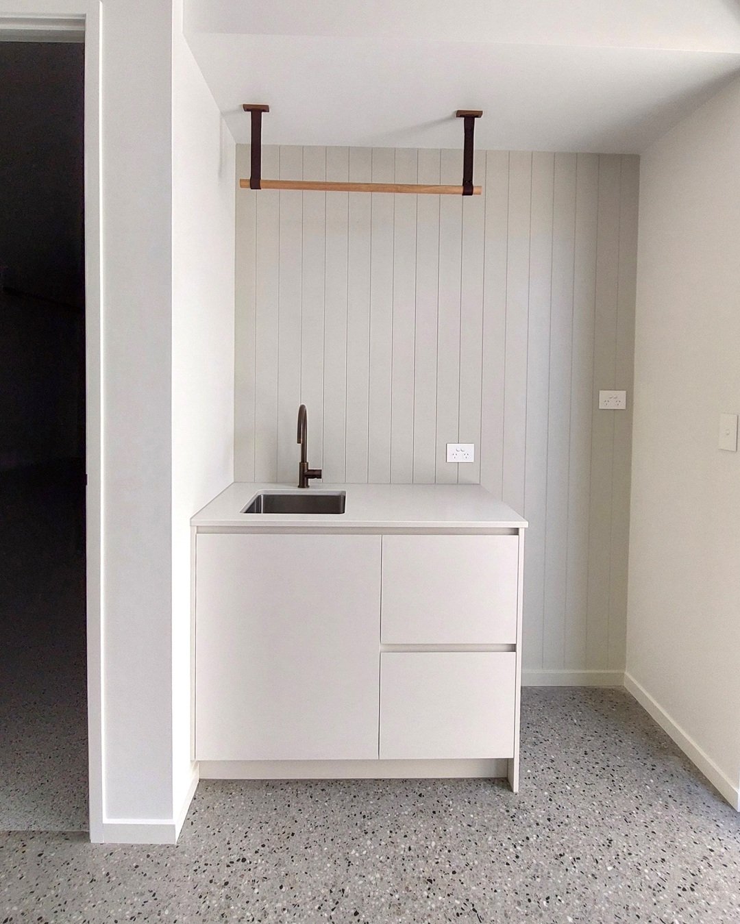 Par Taps Sol burnished sink mixer. Oliveri Sonetto stainless steel sink. Horley Homes Dicky Beach laundry.