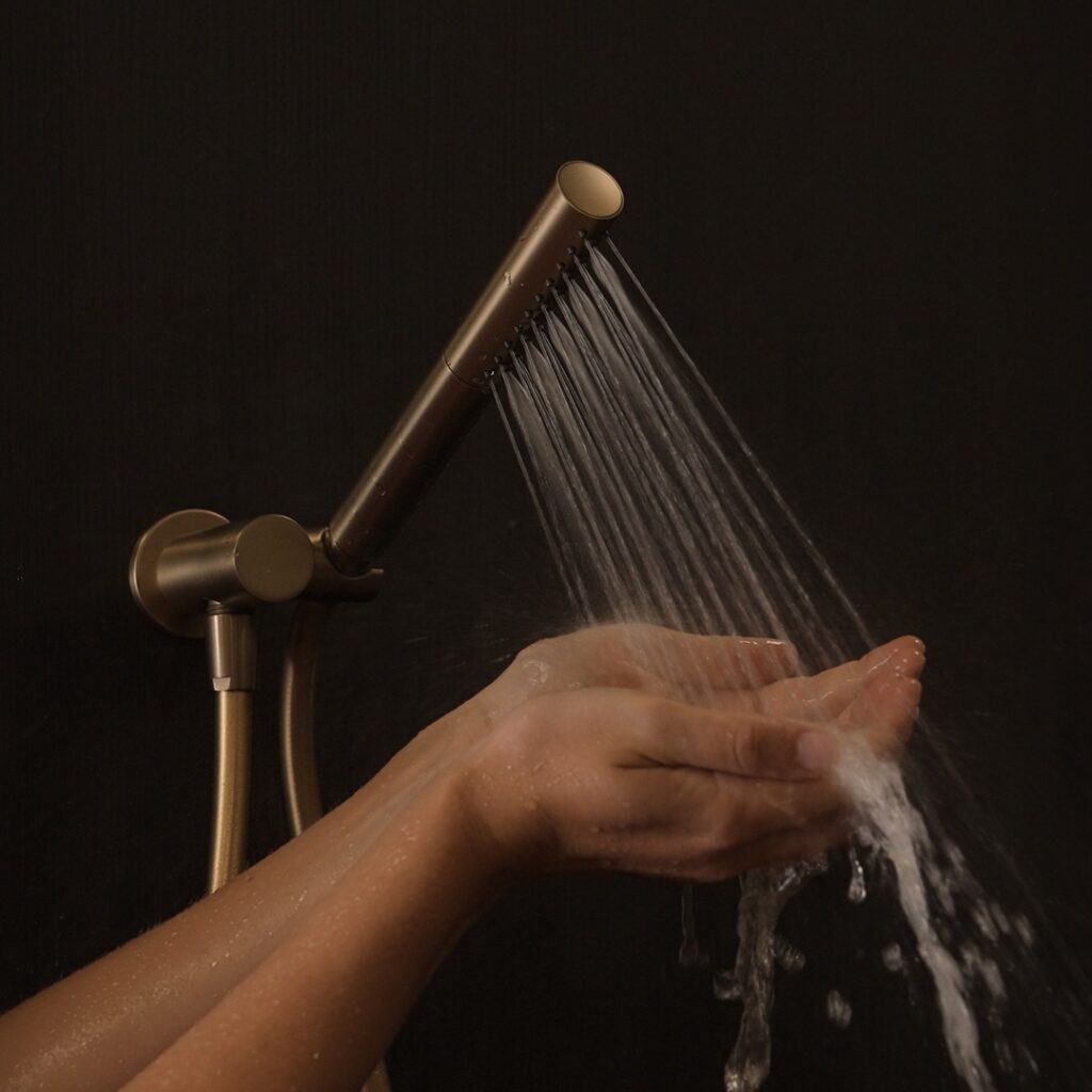 caroma liano ii slim hand shower brushed brass