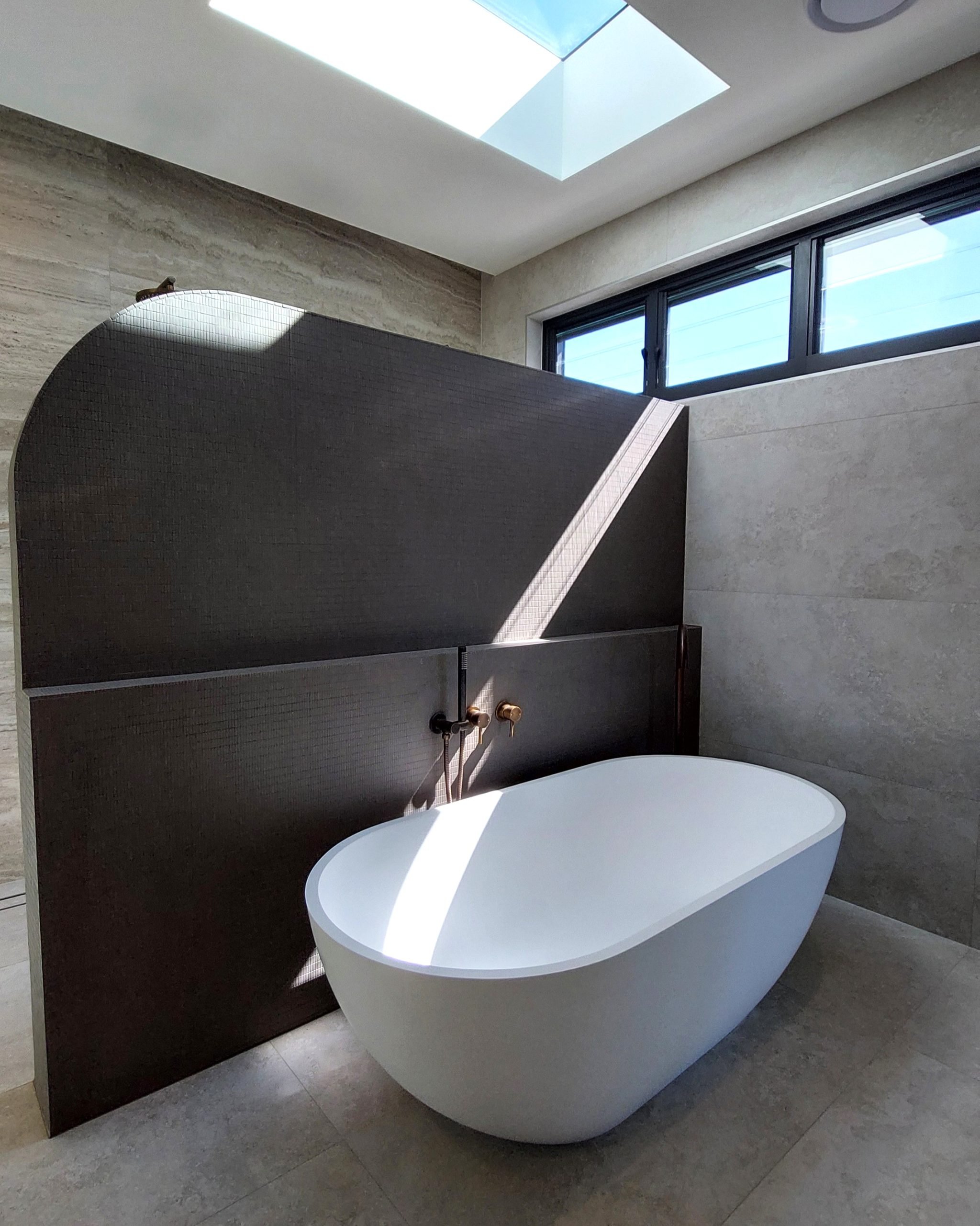 Fienza Nero stone freestanding bath - Horley Homes Dicky Beach project.