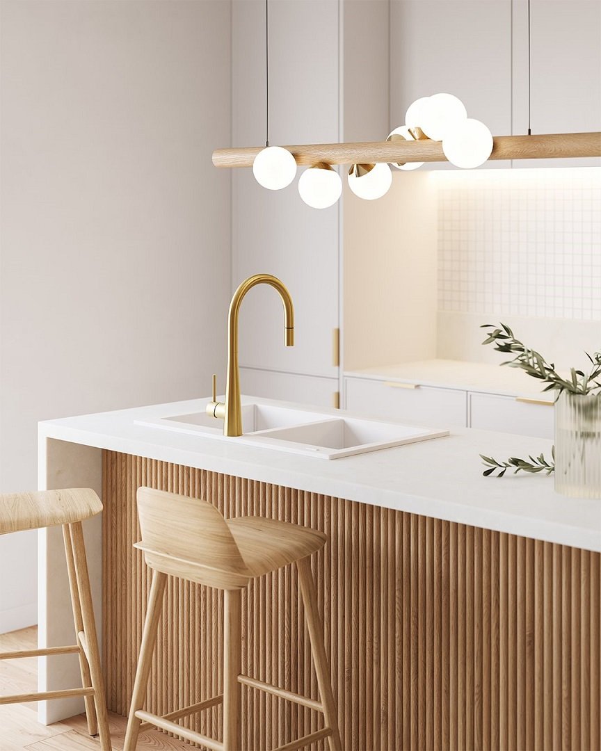 Oliveri Essente brushed gold pull out spray sink mixer with Santorini white granite sink.