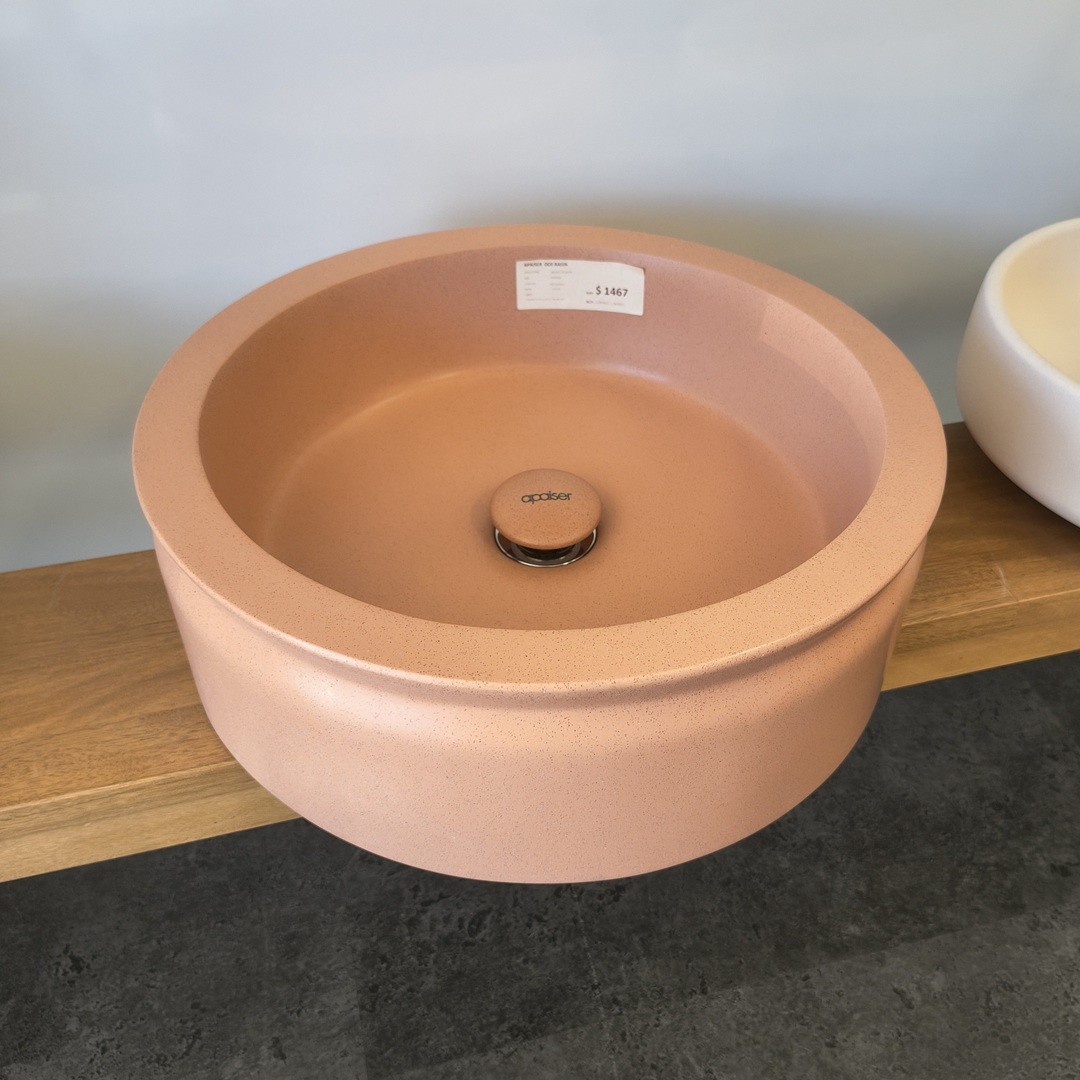 Apaiser Ode 'red earth' finish marble basin.