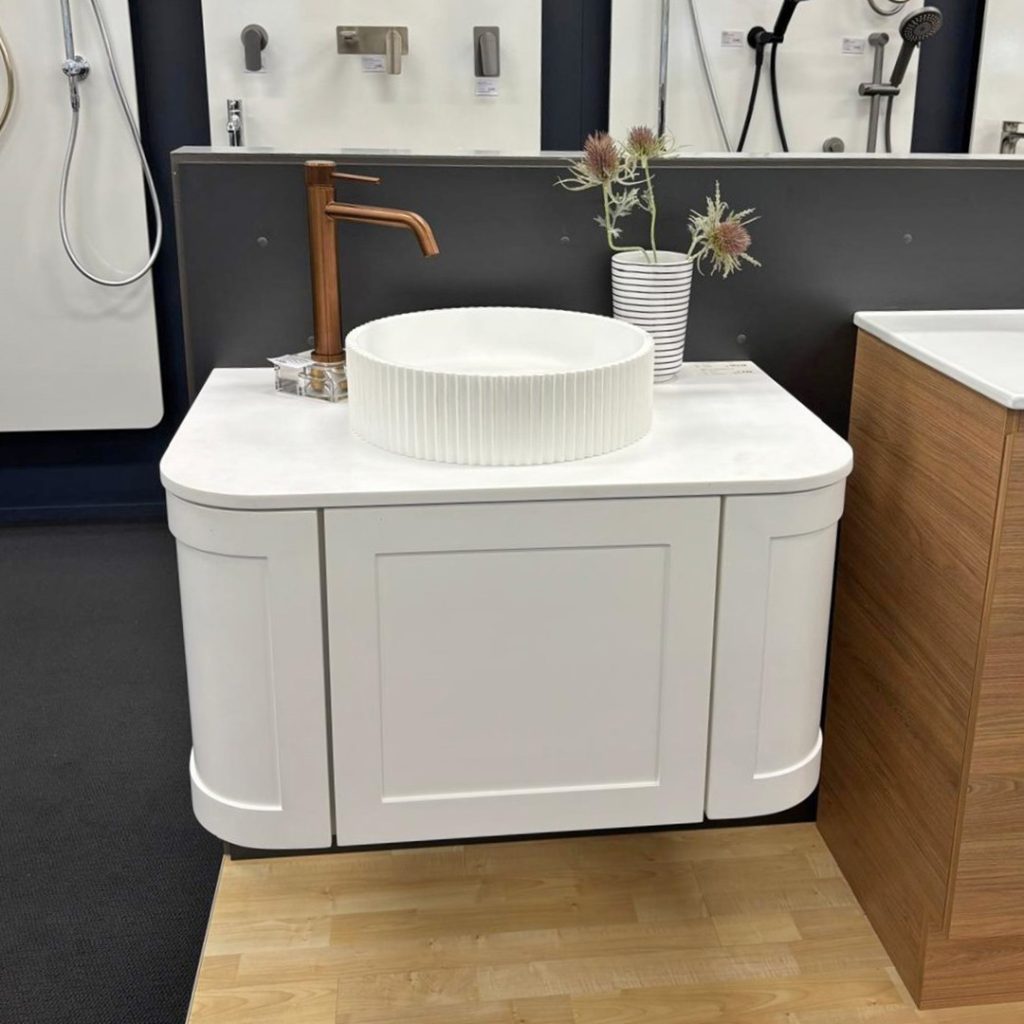 cassa design westminster 750 curved vanity, matte white finish with fluted matte white basin.